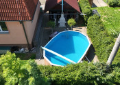 Nová cena! Dom, ktorý môže zarábať: 2 byty+dielňa+garáž+pozemok 1276 m2 v Čiernom-Trojmedzie. - fotografia 4