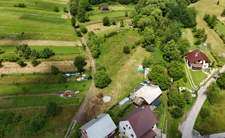 Rovinatý pozemok v Divine s platným stavebným povolením - fotografia 6